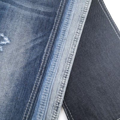 GX D51B822-3  Width: 178-180cm  Weight: 6.2OZ  Shrinkage: Warp: 6-7%, Weft: 2-3%  Weave: 3/1 Right-hand twill  Composition: 99.3% Cotton, 0.2% Tencel, 0.5% Rayon side view